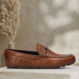 A cognac Men's bugatti Drivers featuring a round toe apron toe, zero heels heel. Made from premium genuine leather with a durable rubber outsole, this slip-on design offers both style and comfort.