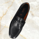 A black Men's bugatti Drivers featuring a round toe apron toe, zero heels heel. Made from premium genuine leather with a durable rubber outsole, this slip-on design offers both style and comfort.