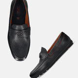 A blue Men's bugatti Drivers featuring a round toe apron toe, zero heels heel. Made from premium genuine leather with a durable rubber outsole, this slip-on design offers both style and comfort.