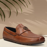 A cognac Men's bugatti Drivers featuring a round toe apron toe, zero heels heel. Made from premium genuine leather with a durable rubber outsole, this slip-on design offers both style and comfort.