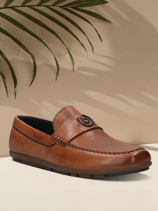 A cognac Men's bugatti Drivers featuring a round toe apron toe, zero heels heel. Made from premium genuine leather with a durable rubber outsole, this slip-on design offers both style and comfort.