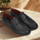 A black Men's bugatti Drivers featuring a round toe apron toe, zero heels heel. Made from premium genuine leather with a durable rubber outsole, this slip-on design offers both style and comfort.