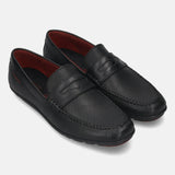 A black Men's bugatti Drivers featuring a round toe apron toe, zero heels heel. Made from premium genuine leather with a durable rubber outsole, this slip-on design offers both style and comfort.