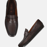 A brown Men's bugatti Drivers featuring a round toe apron toe, zero heels heel. Made from premium genuine leather with a durable rubber outsole, this slip-on design offers both style and comfort.