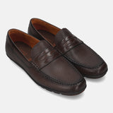 A brown Men's bugatti Drivers featuring a round toe apron toe, zero heels heel. Made from premium genuine leather with a durable rubber outsole, this slip-on design offers both style and comfort.