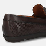A brown Men's bugatti Drivers featuring a round toe apron toe, zero heels heel. Made from premium genuine leather with a durable rubber outsole, this slip-on design offers both style and comfort.