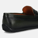 Men's Bugatti drivers green leather shoes with a round toe and apron toe , a tpr outsole.