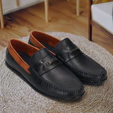 Men's Bugatti drivers blue leather shoes with a round toe and apron toe , a tpr outsole.