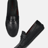 Men's Bugatti drivers black leather shoes with a round toe and apron toe , a tpr outsole.
