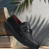 Men's Bugatti drivers black leather shoes with a round toe and apron toe , a tpr outsole.