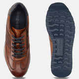 Men's Bugatti leather cognac leather shoes with a round toe , a tpr outsole , and laces fastening.