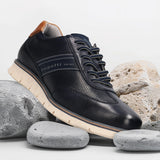 Men's Bugatti leather blue leather shoes with a round toe , a tpr outsole , and laces fastening.