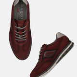 A grey Men's bugatti Casuals Shoes featuring a round toe wing tip, zero heels heel, and a wide fit. Made from premium genuine leather with a durable tr outsole, this laces design offers both style and comfort.