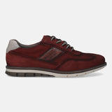 A grey Men's bugatti Casuals Shoes featuring a round toe wing tip, zero heels heel, and a wide fit. Made from premium genuine leather with a durable tr outsole, this laces design offers both style and comfort.