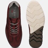 A grey Men's bugatti Casuals Shoes featuring a round toe wing tip, zero heels heel, and a wide fit. Made from premium genuine leather with a durable tr outsole, this laces design offers both style and comfort.