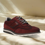 A grey Men's bugatti Casuals Shoes featuring a round toe wing tip, zero heels heel, and a wide fit. Made from premium genuine leather with a durable tr outsole, this laces design offers both style and comfort.