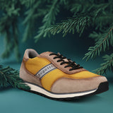A yellow Men's bugatti Sneakers featuring a round plain toe, zero heels heel. Made from suede leather with a durable tpr outsole, this laces design offers both style and comfort.
