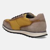 A yellow Men's bugatti Sneakers featuring a round plain toe, zero heels heel. Made from suede leather with a durable tpr outsole, this laces design offers both style and comfort.