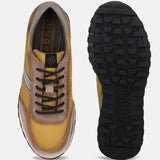 A yellow Men's bugatti Sneakers featuring a round plain toe, zero heels heel. Made from suede leather with a durable tpr outsole, this laces design offers both style and comfort.