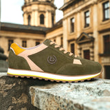A green Men's bugatti Sneakers featuring a round plain toe, zero heels heel. Made from suede leather with a durable eva outsole, this laces design offers both style and comfort.