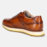 A cognac Men's bugatti Sneakers featuring a round plain toe, zero heels heel. Made from premium genuine leather with a durable eva outsole, this laces design offers both style and comfort.