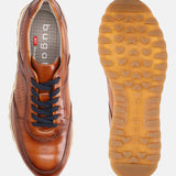 A cognac Men's bugatti Sneakers featuring a round plain toe, zero heels heel. Made from premium genuine leather with a durable eva outsole, this laces design offers both style and comfort.