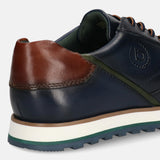 A blue Men's bugatti Sneakers featuring a round toe plain toe, zero heels heel. Made from premium genuine leather with a durable eva outsole, this laces design offers both style and comfort.