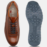 A cognac Men's bugatti Sneakers featuring a round toe plain toe, zero heels heel. Made from premium genuine leather with a durable eva outsole, this laces design offers both style and comfort.
