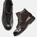 A brown Men's bugatti Ankle Boots featuring a round toe plain toe, moulded  heel. Made from premium genuine leather with a durable tr outsole, this zipper design offers both style and comfort.