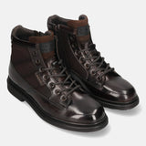 A brown Men's bugatti Ankle Boots featuring a round toe plain toe, moulded heel. Made from premium genuine leather with a durable tr outsole, this zipper design offers both style and comfort.