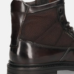 A brown Men's bugatti Ankle Boots featuring a round toe plain toe, moulded  heel. Made from premium genuine leather with a durable tr outsole, this zipper design offers both style and comfort.