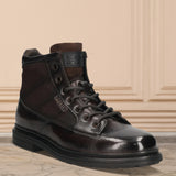 A brown Men's bugatti Ankle Boots featuring a round toe plain toe, moulded heel. Made from premium genuine leather with a durable tr outsole, this zipper design offers both style and comfort.