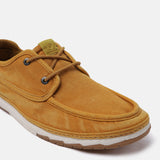 A yellow Men's bugatti Sneakers featuring a round plain toe, zero heels heel. Made from textile with a durable tpr outsole, this laces design offers both style and comfort.