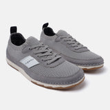 A grey Men's bugatti Sneakers featuring a round plain toe, zero heels heel. Made from textile with a durable tpr outsole, this laces design offers both style and comfort.