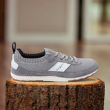 A grey Men's bugatti Sneakers featuring a round plain toe, zero heels heel. Made from textile with a durable tpr outsole, this laces design offers both style and comfort.
