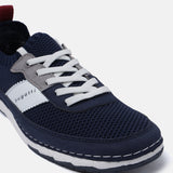 A blue Men's bugatti Sneakers featuring a round plain toe, zero heels heel. Made from textile with a durable tpr outsole, this laces design offers both style and comfort.