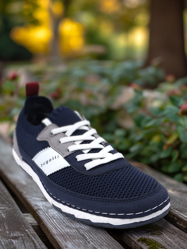 A blue Men's bugatti Sneakers featuring a round plain toe, zero heels heel. Made from textile with a durable tpr outsole, this laces design offers both style and comfort.