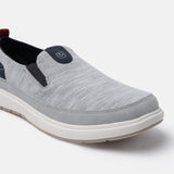 A grey Men's bugatti Casual Loafers featuring a round plain toe, zero heels heel. Made from synthetic with a durable eva outsole, this slip-on design offers both style and comfort.