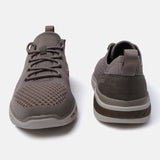 A beige Men's bugatti Sneakers featuring a round plain toe, zero heels heel. Made from textile with a durable eva outsole, this laces design offers both style and comfort.