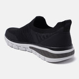 A black Men's bugatti Slip-On Sneakers featuring a round plain toe, zero heels heel. Made from textile with a durable eva outsole, this slip-on design offers both style and comfort.
