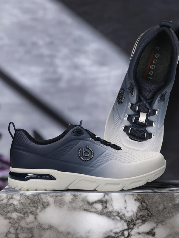 A grey Men's bugatti Athileisure Sneakers featuring a round toe plain toe, zero heels heel. Made from synthetic with a durable eva outsole, this laces design offers both style and comfort.