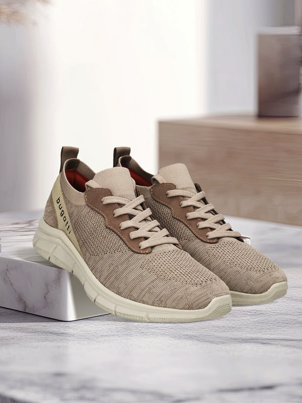 A beige Men's bugatti Sneakers featuring a round plain toe, zero heels heel. Made from textile with a durable eva outsole, this laces design offers both style and comfort.
