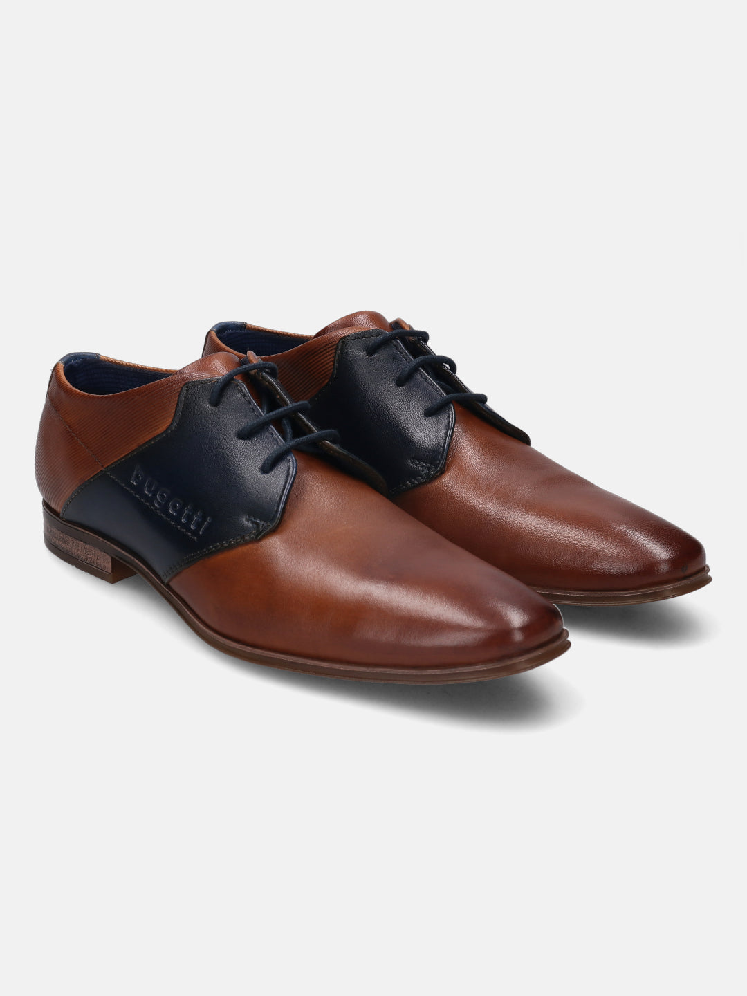 A cognac Men's bugatti Derby featuring a pointed plain toe, stacked heel. Made from premium genuine leather with a durable high quality synthetic outsole, this laces design offers both style and comfort.