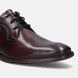 A brown Men's bugatti Derby featuring a round plain toe, stacked heel. Made from premium genuine leather with a durable leather outsole, this laces design offers both style and comfort.