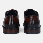 A brown Men's bugatti Brogue featuring a round wingcap, stacked heel. Made from premium genuine leather with a durable leather outsole, this laces design offers both style and comfort.