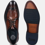 A brown Men's bugatti Brogue featuring a round wingcap, stacked heel. Made from premium genuine leather with a durable leather outsole, this laces design offers both style and comfort.