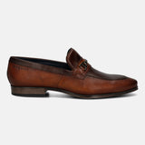 A cognac Men's bugatti Bit Loafer featuring a pointed toe apron toe, stacked heel. Made from premium genuine leather with a durable tpr outsole, this slip-on design offers both style and comfort.