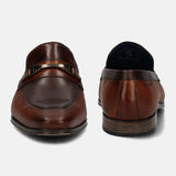 A cognac Men's bugatti Bit Loafer featuring a pointed toe apron toe, stacked heel. Made from premium genuine leather with a durable tpr outsole, this slip-on design offers both style and comfort.