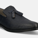 A blue Men's bugatti Tassel Loafers featuring a pointed toe plain toe, stacked heel. Made from premium genuine leather with a durable leather outsole, this slip-on design offers both style and comfort.