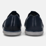 A blue Men's bugatti Casual Loafers featuring a round plain toe, zero heels heel. Made from premium genuine leather with a durable tr outsole, this slip-on design offers both style and comfort.